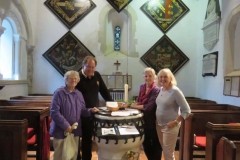 All Saints Church - The Hatchments and Early Norman Font